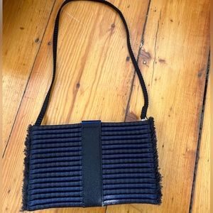 Rothy’s Tassel Clutch